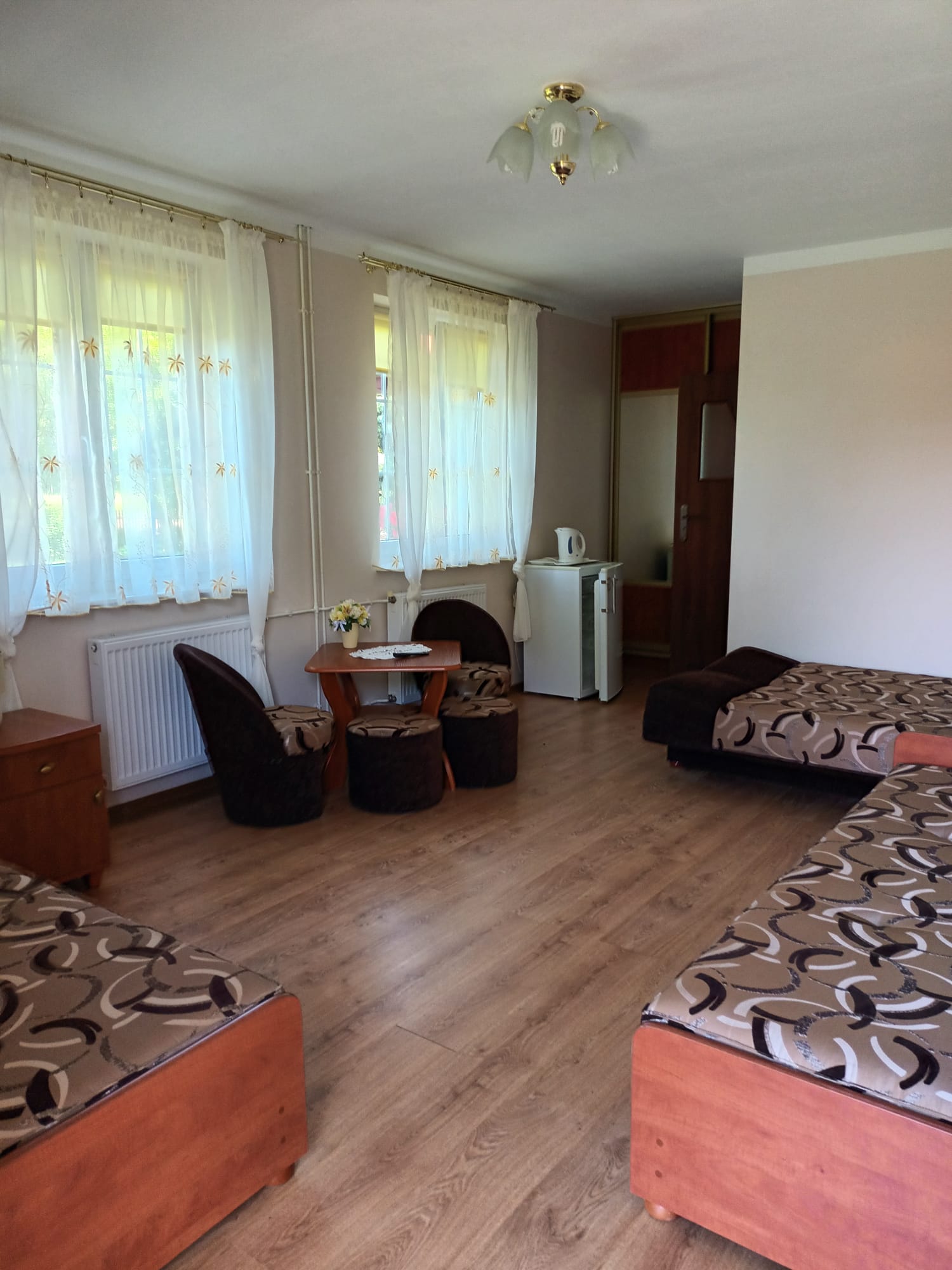 Room with kettle and fridge